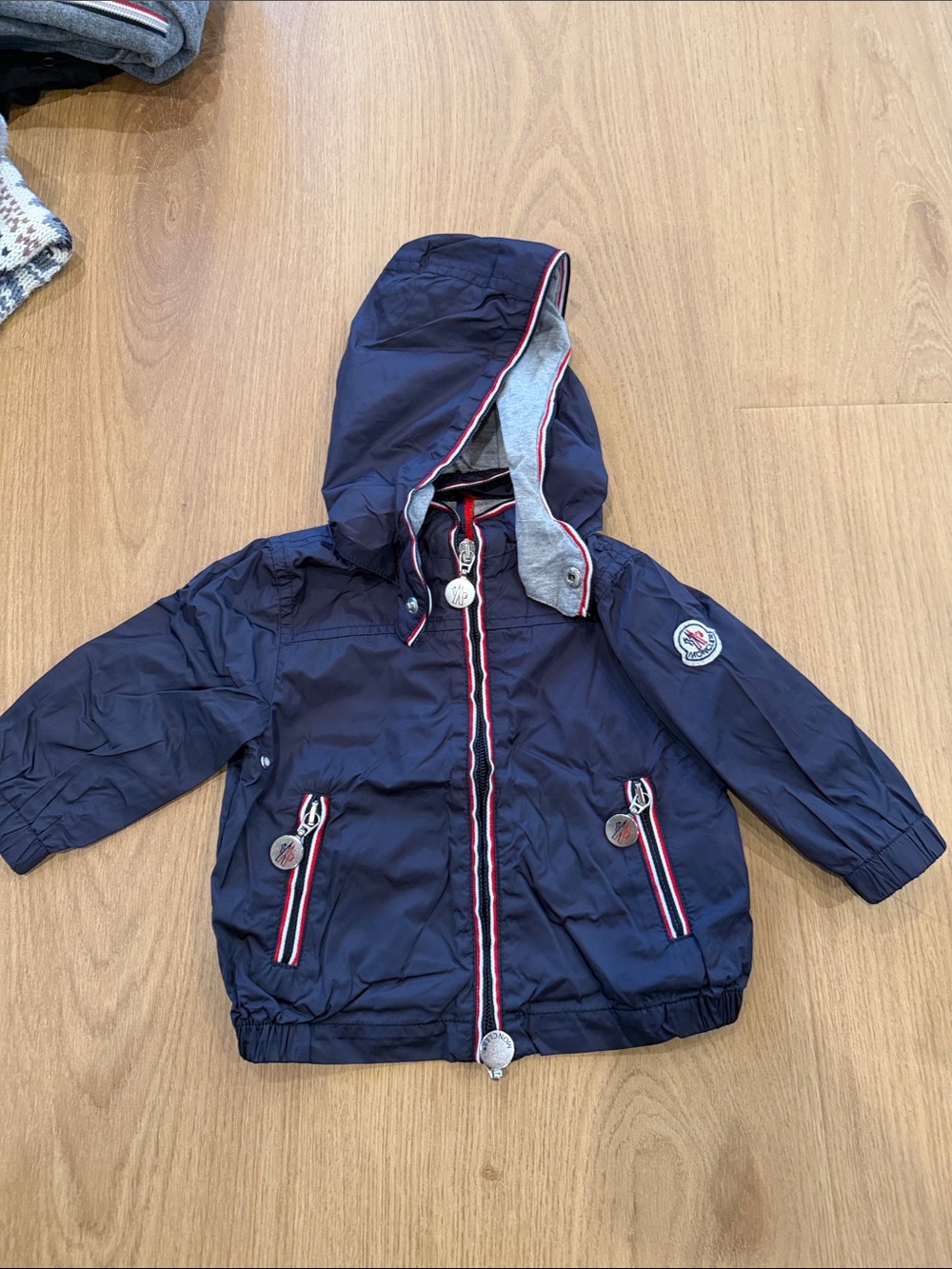 Moncler Navy Hooded Puffer Jacket with Red & White Trim